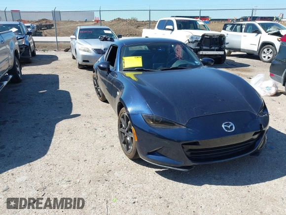 2021 Mazda MX-5 Miata Grand Touring with VIN JM1NDAM7XM0455743, listed as a IAAI auction lot 42067373 with 28,255 mi miles and . Bid and sale history available at DreamBid. Image 1.