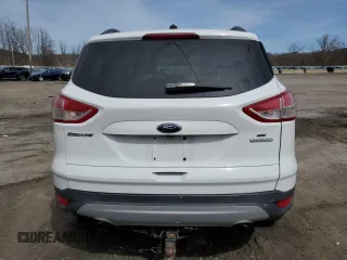 2014 Ford Escape SE with VIN 1FMCU0GX4EUB83323, listed as a Copart auction lot 51775125 with 129,437 mi miles and Salvage Title. Bid and sale history available at DreamBid. Image 6.