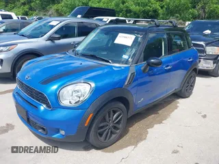 2013 MINI Countryman S ALL4 with VIN WMWZC5C53DWM16126, listed as a IAAI auction lot 42108272 with 118,314 mi miles and . Bid and sale history available at DreamBid. Image 2.