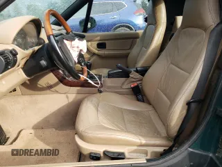1997 BMW 3 Series 1.9L with VIN 4USCH7326VLE03317, listed as a Copart auction lot 62658674 with 93,261 mi miles and Salvage Title. Bid and sale history available at carsss.com. Image 7.