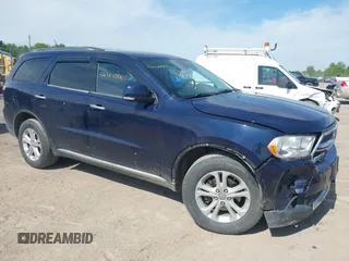 2013 Dodge Durango Crew z VIN 1C4RDJDG3DC596508, wystawiony jako IAAI lot #42361582 z przebiegiem 112 124 mil mil oraz . Historia ofert i sprzedaży dostępna na DreamBid. Obrazek 1.