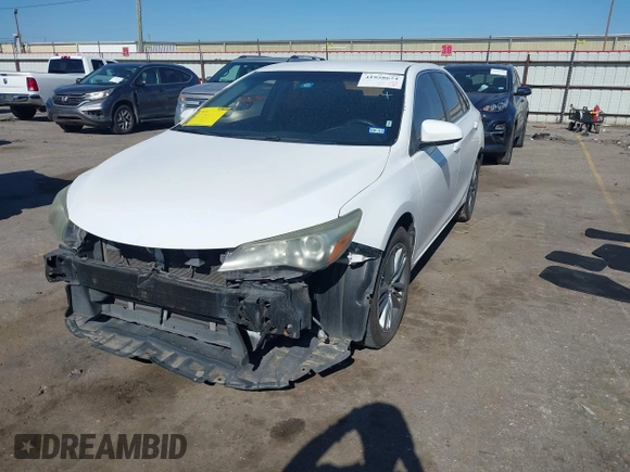 2015 Toyota Camry XLE with VIN 4T1BF1FK2FU001539, listed as a IAAI auction lot 41958674 with 163,758 mi miles and . Bid and sale history available at DreamBid. Image 2.