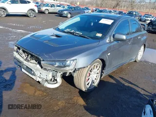 2008 Mitsubishi Lancer Evolution GSR with VIN JA3AW86V18U044077, listed as a IAAI auction lot 41208625 with 157,788 mi miles. Bid and sale history available at carsss.com. Image 20.