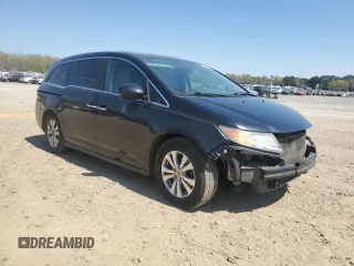 2016 Honda Odyssey EX-L with VIN 5FNRL5H69GB072797, listed as a Copart auction lot 50253825 with 200,970 mi miles and Salvage Title. Bid and sale history available at DreamBid. Image 4.