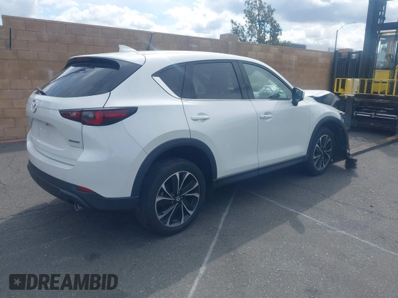 2023 Mazda CX-5 2.5 S Premium Plus Package with VIN JM3KFBEM4P0112803, listed as a IAAI auction lot 41588872 with 25,087 mi miles. Bid and sale history available at carsss.com. Image 4.