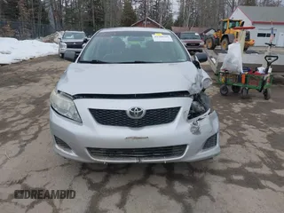 2010 Toyota Corolla with VIN 2T1BU4EE2AC291410, listed as a IAAI auction lot 41709795 with 148,598 mi miles. Bid and sale history available at carsss.com. Image 12.