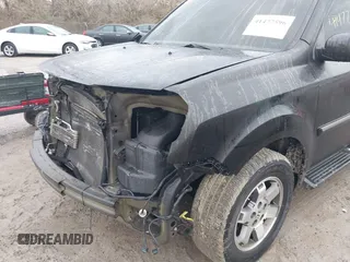 2011 Honda Pilot Touring with VIN 5FNYF4H94BB089930, listed as a IAAI auction lot 41477596 with 171,831 mi miles. Bid and sale history available at carsss.com. Image 19.