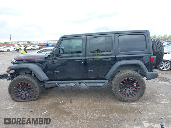 2022 Jeep Wrangler Unlimited Sport S z VIN 1C4HJXDG0NW133801, wystawiony jako IAAI lot #41908846 z przebiegiem 44 743 mil mil oraz . Historia ofert i sprzedaży dostępna na DreamBid. Obrazek 14.