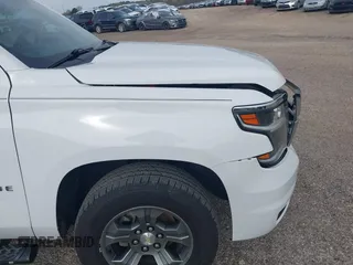 2017 Chevrolet Tahoe LT with VIN 1GNSKBKCXHR350028, listed as a IAAI auction lot 41684954 with 117,261 mi miles and . Bid and sale history available at DreamBid. Image 19.