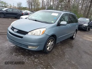 2005 Toyota Sienna XLE with VIN 5TDZA22C95S386560, listed as a IAAI auction lot 41943555 with 230,708 mi miles and . Bid and sale history available at DreamBid. Image 2.