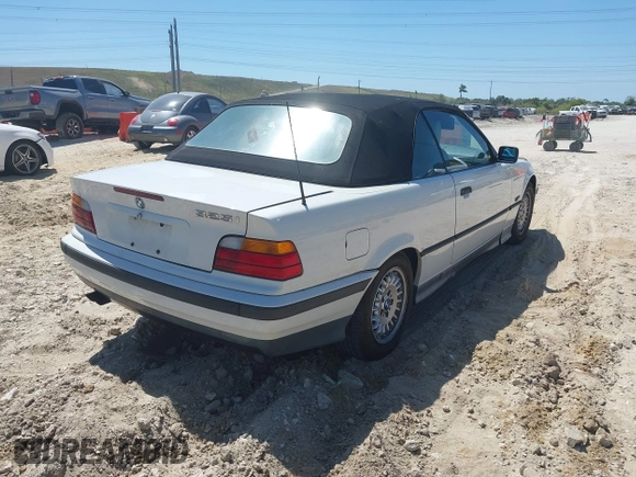 1995 BMW 3 Series 325iC with VIN WBABJ632XSJD40243, listed as a IAAI auction lot 41838410 with 199,909 mi miles. Bid and sale history available at carsss.com. Image 4.