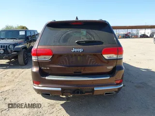 2015 Jeep Grand Cherokee Summit with VIN 1C4RJFJGXFC125131, listed as a IAAI auction lot 42475017 with 128,166 mi miles and . Bid and sale history available at DreamBid. Image 16.