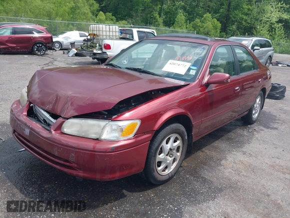 2000 Toyota Camry CE z VIN JT2BG22K3Y0521541, wystawiony jako IAAI lot #42074772 z przebiegiem 144 587 mil mil oraz . Historia ofert i sprzedaży dostępna na DreamBid. Obrazek 20.