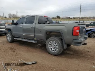 2018 GMC Sierra 2500HD Denali z VIN 1GT12UEY4JF128650, wystawiony jako Copart lot #51102895 z przebiegiem 131 010 mil mil oraz Szkoda całkowita • Salvage title. Historia ofert i sprzedaży dostępna na DreamBid. Obrazek 2.