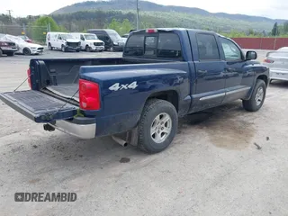 2005 Dodge Dakota Laramie with VIN 1D7HW58NX5S227633, listed as a IAAI auction lot 42122619 with 85,338 mi miles and . Bid and sale history available at DreamBid. Image 4.