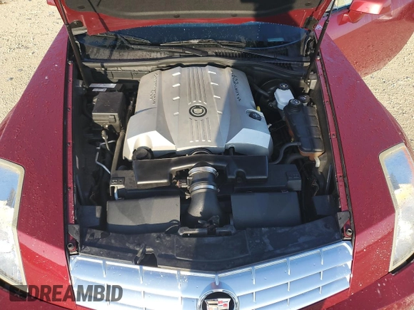 2007 Cadillac XLR z VIN 1G6YV36A775600889, wystawiony jako Copart lot #74500024 z przebiegiem Nie podano mil oraz Szkody całkowita. Historia ofert i sprzedaży dostępna na DreamBid. Obrazek 11.