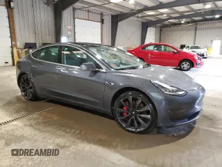 2020 Tesla Model 3 Performance z VIN 5YJ3E1EC8LF640891, wystawiony jako Copart lot #52377615 z przebiegiem 77 343 mil mil oraz Szkoda całkowita • Salvage title. Historia ofert i sprzedaży dostępna na DreamBid. Obrazek 4.