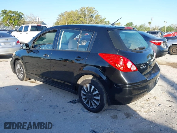 2009 Nissan Versa 1.8 SL with VIN 3N1BC13E79L476570, listed as a IAAI auction lot 41804750 with 160,449 mi miles. Bid and sale history available at carsss.com. Image 3.