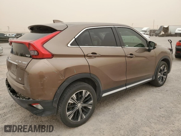 2018 Mitsubishi Eclipse Cross SE with VIN JA4AT5AAXJZ047950, listed as a Copart auction lot 56974775 with 83,060 mi miles and Salvage title. Bid and sale history available at DreamBid. Image 3.
