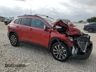 2022 Toyota Corolla Cross XLE with VIN 7MUDAAAG7NV019610, listed as a Copart auction lot 55146165 with 13,633 mi miles and Salvage title. Bid and sale history available at DreamBid. Image 4.