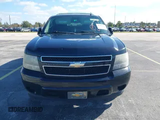 2011 Chevrolet Suburban LS with VIN 1GNSCHE04BR284777, listed as a IAAI auction lot 41291991 with 285,187 mi miles. Bid and sale history available at carsss.com. Image 12.