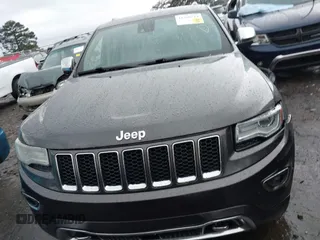 2014 Jeep Grand Cherokee Overland with VIN 1C4RJFCT2EC146239, listed as a IAAI auction lot 41368514 with 164,239 mi miles. Bid and sale history available at carsss.com. Image 12.