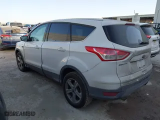 2014 Ford Escape SE with VIN 1FMCU0GX8EUB31399, listed as a IAAI auction lot 41795927 with 129,963 mi miles. Bid and sale history available at carsss.com. Image 3.
