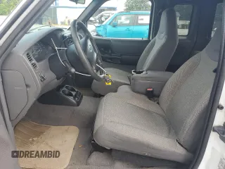 2002 Ford Ranger XL Fleet with VIN 1FTYR44U42TA55243, listed as a Copart auction lot 57310015 with 135,974 mi miles and Salvage title. Bid and sale history available at DreamBid. Image 7.