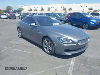 2013 BMW 6 Series 650i with VIN WBAYM9C53DDW20145, listed as a IAAI auction lot 42039618 with 66,684 mi miles and . Bid and sale history available at carsss.com. Image 1.