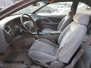 1995 Ford Thunderbird LX with VIN 1FALP62W3SH119037, listed as a Copart auction lot 41517485 with 164,133 mi miles and Salvage Title. Bid and sale history available at carsss.com. Image 7.
