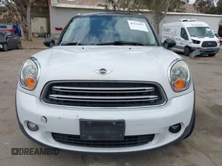 2015 MINI Countryman with VIN WMWZB3C57FWR46707, listed as a IAAI auction lot 42114457 with 137,356 mi miles and . Bid and sale history available at DreamBid. Image 12.
