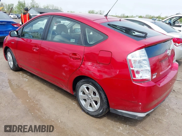 2009 Toyota Prius with VIN JTDKB20U397887194, listed as a IAAI auction lot 42189729 with 214,267 mi miles and . Bid and sale history available at DreamBid. Image 3.