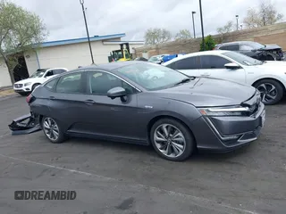2018 Honda Clarity Plug-In Hybrid with VIN JHMZC5F14JC017006, listed as a IAAI auction lot 42064754 with 36,976 mi miles. Bid and sale history available at carsss.com. Image 14.