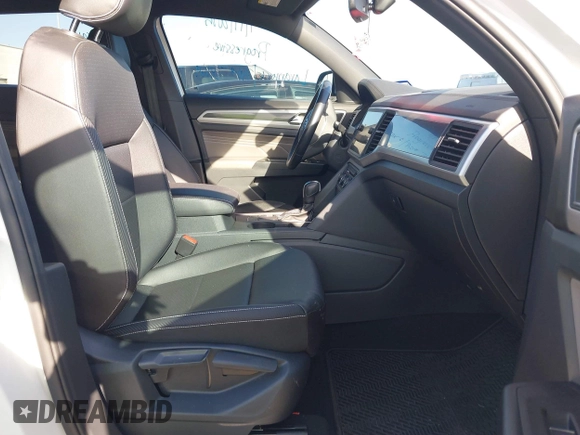 2021 Volkswagen Atlas SE with VIN 1V2PE2CA4MC203850, listed as a IAAI auction lot 41634034 with 56,336 mi miles and . Bid and sale history available at DreamBid. Image 5.