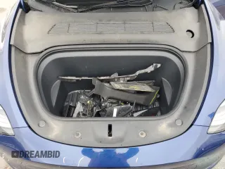2023 Tesla Model Y Long Range with VIN 7SAYGAEE6PF689615, listed as a Copart auction lot 50999385 with 16,514 mi miles and Salvage Title. Bid and sale history available at DreamBid. Image 12.