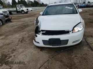 2014 Chevrolet Impala LT with VIN 2G1WB5E31E1154130, listed as a Copart auction lot 54212785 with 150,169 mi miles and Salvage title. Bid and sale history available at DreamBid. Image 13.