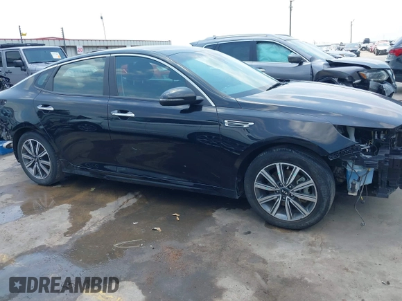 2019 Kia Optima LX with VIN 5XXGT4L38KG375297, listed as a IAAI auction lot 42269791 with 123,631 mi miles and . Bid and sale history available at DreamBid. Image 14.