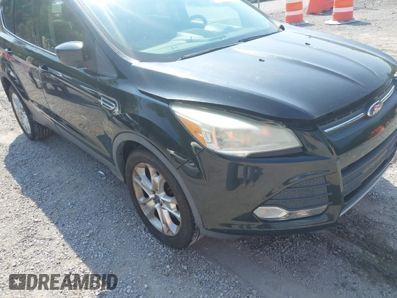 2013 Ford Escape SE z VIN 1FMCU9GX5DUA19887, wystawiony jako IAAI lot #42580986 z przebiegiem 169 407 mil mil oraz . Historia ofert i sprzedaży dostępna na DreamBid. Obrazek 18.