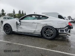 2021 Ford Mustang EcoBoost z VIN 1FA6P8TH5M5126729, wystawiony jako Copart lot #65464594 z przebiegiem 25 590 mil mil oraz Szkoda całkowita • Salvage title. Historia ofert i sprzedaży dostępna na DreamBid. Obrazek 2.