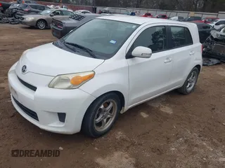 2008 Scion xD with VIN JTKKU104X8J001399, listed as a IAAI auction lot 41638009 with 220,468 mi miles. Bid and sale history available at carsss.com. Image 2.