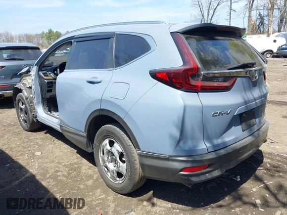 2020 Honda CR-V Touring with VIN 2HKRW2H95LH609144, listed as a IAAI auction lot 41982411 with 36,374 mi miles and . Bid and sale history available at DreamBid. Image 14.