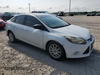 2012 Ford Focus SE z VIN 1FAHP3F2XCL310660, wystawiony jako Copart lot #60217625 z przebiegiem 208 807 mil mil oraz Szkoda całkowita • Salvage title. Historia ofert i sprzedaży dostępna na DreamBid. Obrazek 4.