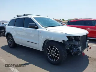 2019 Jeep Grand Cherokee Trailhawk z VIN 1C4RJFLT7KC751143, wystawiony jako IAAI lot #42749406 z przebiegiem 54 024 mil mil oraz . Historia ofert i sprzedaży dostępna na DreamBid. Obrazek 1.
