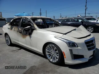 2014 Cadillac CTS Performance RWD с VIN 1G6AS5S35E0130174, выставлен на аукционе Copart как лот 61251475 с пробегом Не указан миль и На запчасти • Non repairable. История ставок и продаж доступна на DreamBid. Изображение 4.