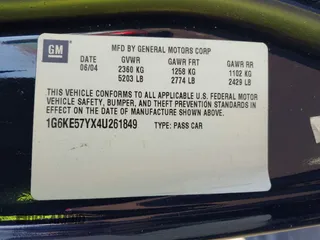 2004 Cadillac DeVille DHS z VIN 1G6KE57YX4U261849, wystawiony jako IAAI lot #41518835 z przebiegiem Nie podano mil oraz . Historia ofert i sprzedaży dostępna na DreamBid. Obrazek 9.