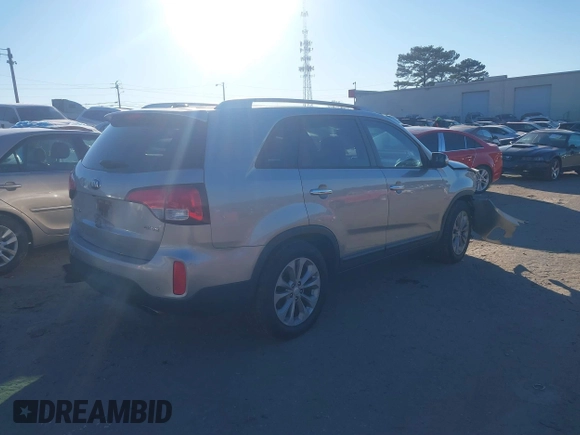 2015 Kia Sorento EX with VIN 5XYKU4A71FG590910, listed as a IAAI auction lot 41378588 with 165,090 mi miles. Bid and sale history available at carsss.com. Image 4.