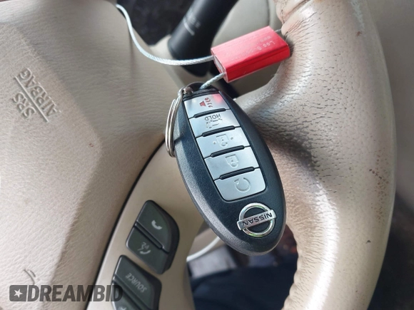 2015 Nissan Pathfinder SV with VIN 5N1AR2MN5FC607557, listed as a IAAI auction lot 41619329 with 151,498 mi miles and . Bid and sale history available at DreamBid. Image 11.