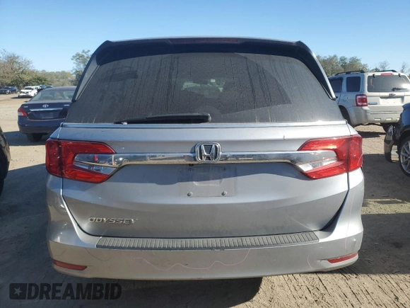 2018 Honda Odyssey LX with VIN 5FNRL6H22JB087152, listed as a Copart auction lot 76754974 with 73,057 mi miles and Salvage Title. Bid and sale history available at carsss.com. Image 6.