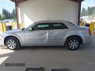 2005 Chrysler 300 Touring with VIN 2C3JA53G75H687752, listed as a IAAI auction lot 42190758 with 170,269 mi miles and . Bid and sale history available at DreamBid. Image 14.