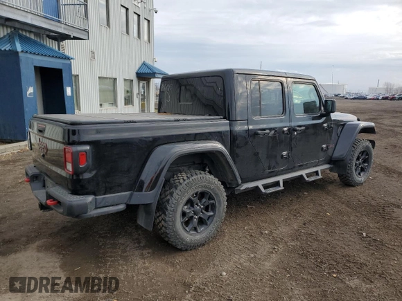 2022 Jeep Gladiator Rubicon with VIN 1C6JJTBG6NL118998, listed as a Copart auction lot 81451814 with 61,125 mi miles and Salvage title. Bid and sale history available at DreamBid. Image 3.